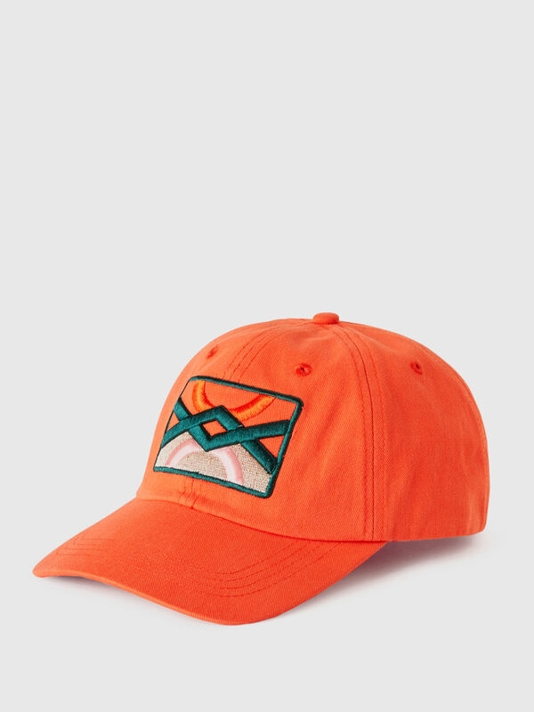 Orange cap with logo patch