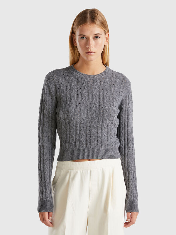 Cropped sweater with cable knit and perforations Women