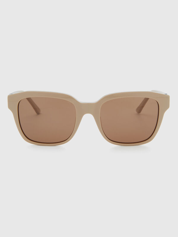 Beige sunglasses with logo