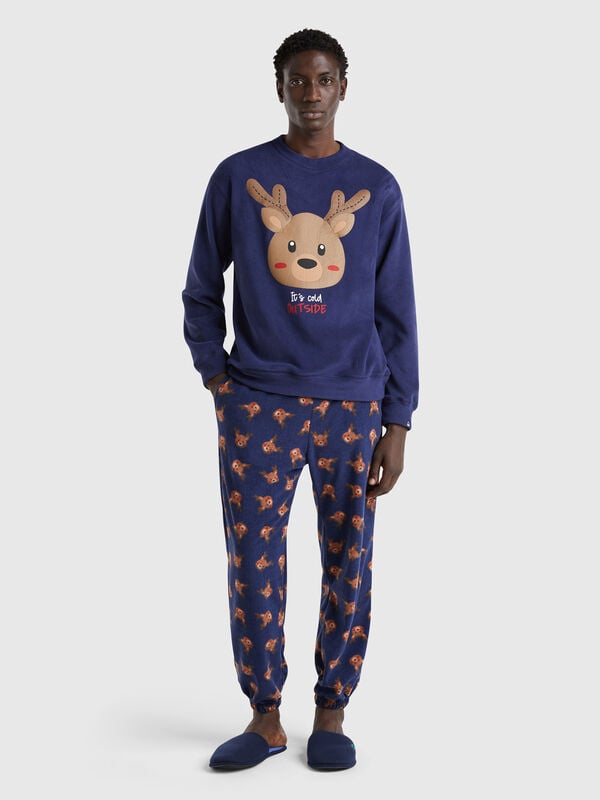 Fleece trousers with reindeer print Men