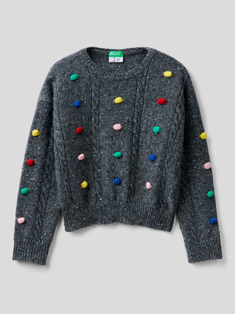 JCCxUCB sweater with pom pom image number 1