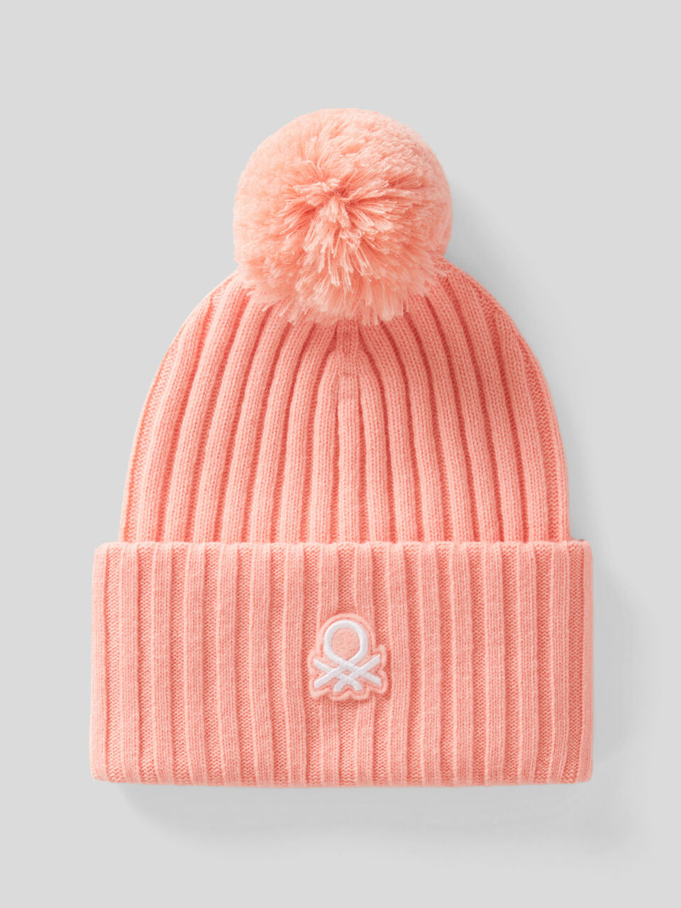 Hat with logo and pom pom image number 1
