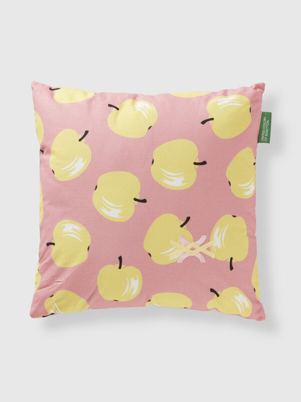 Pink pillow with apple pattern