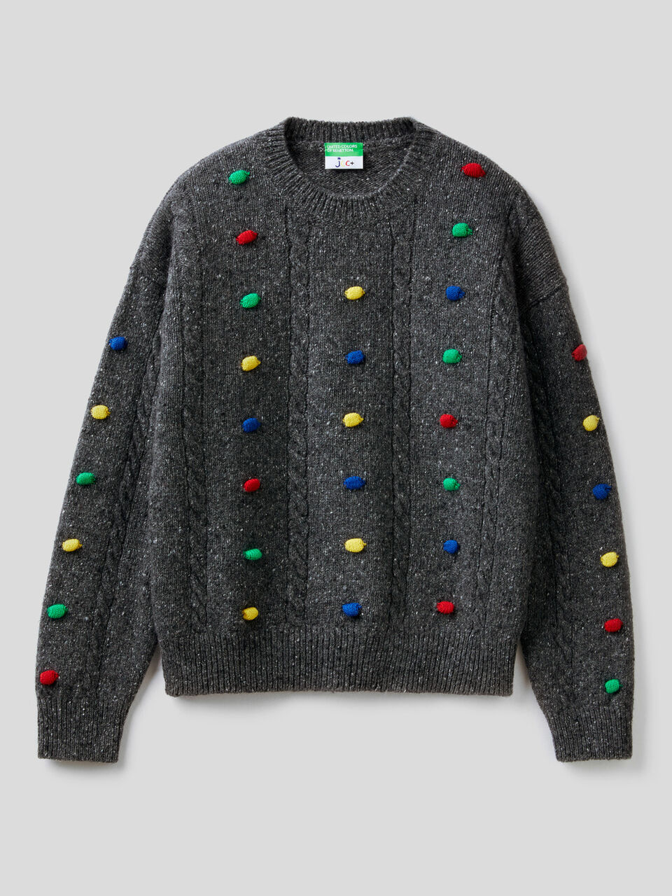 JCCxUCB sweater with pom pom image number 1