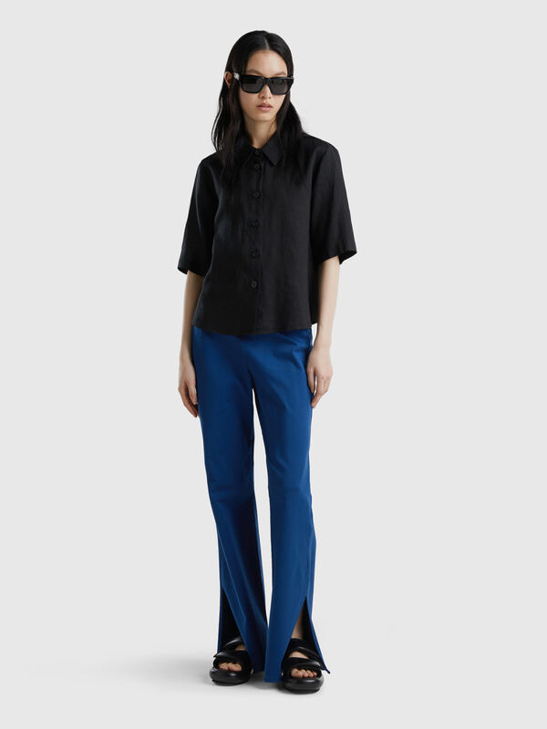 Flared trousers with slits Women