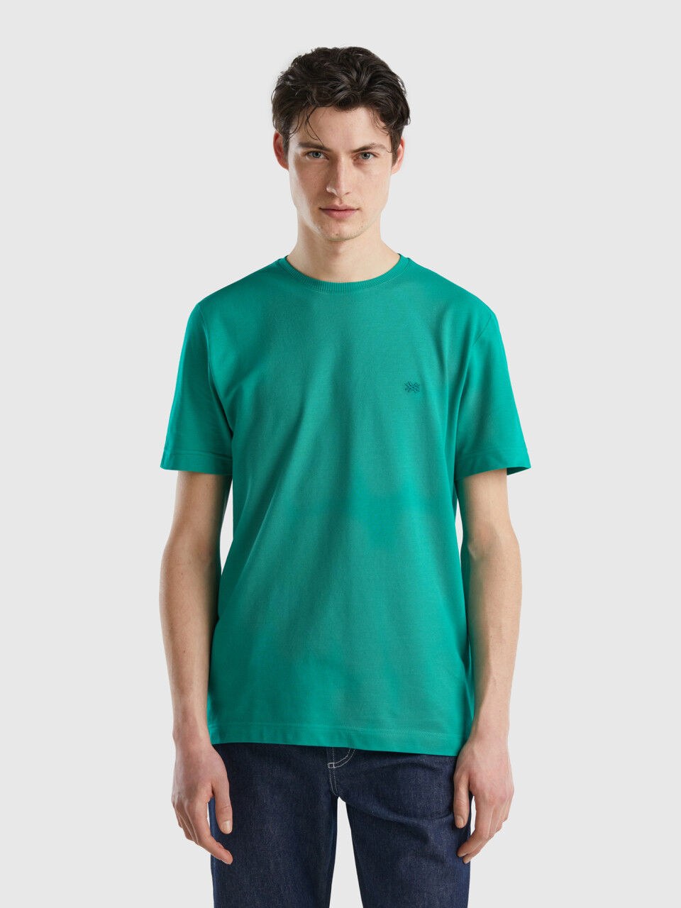 Green t shirt blue shorts online
