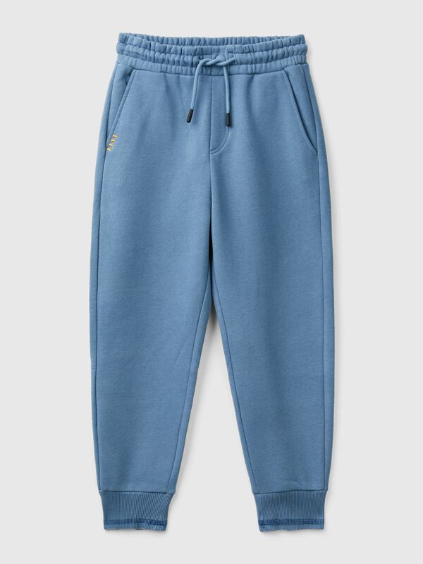 Warm sweatpants with print Junior Boy