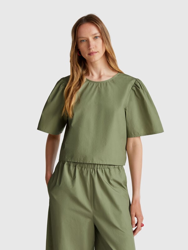 Flared blouse with ruffled sleeves Women