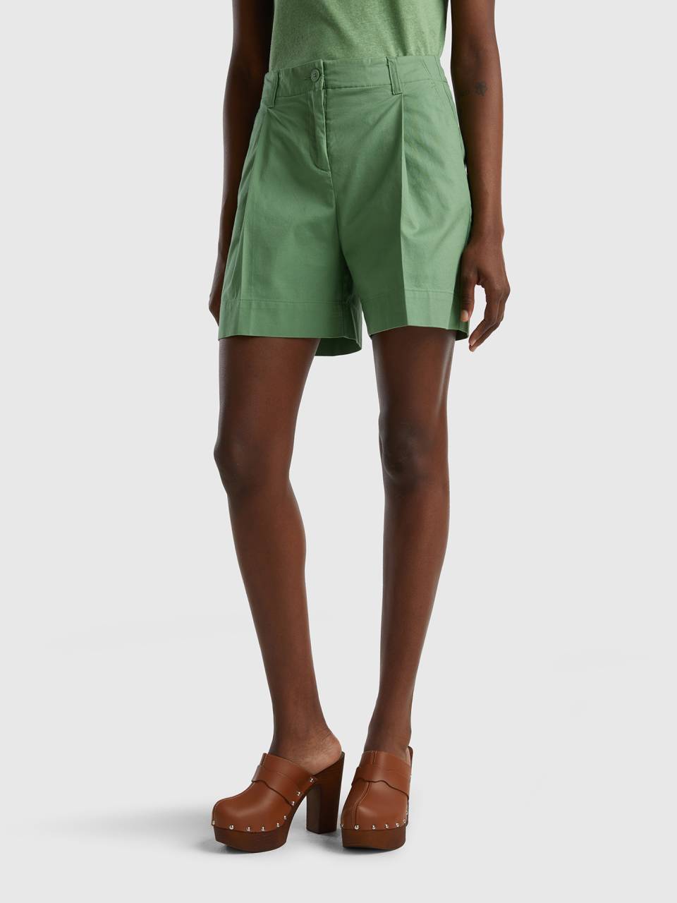Green shirt red shorts store